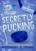 Secretly Pucking: A Why Choose Hockey Romance (Bay Rebels Book 2)